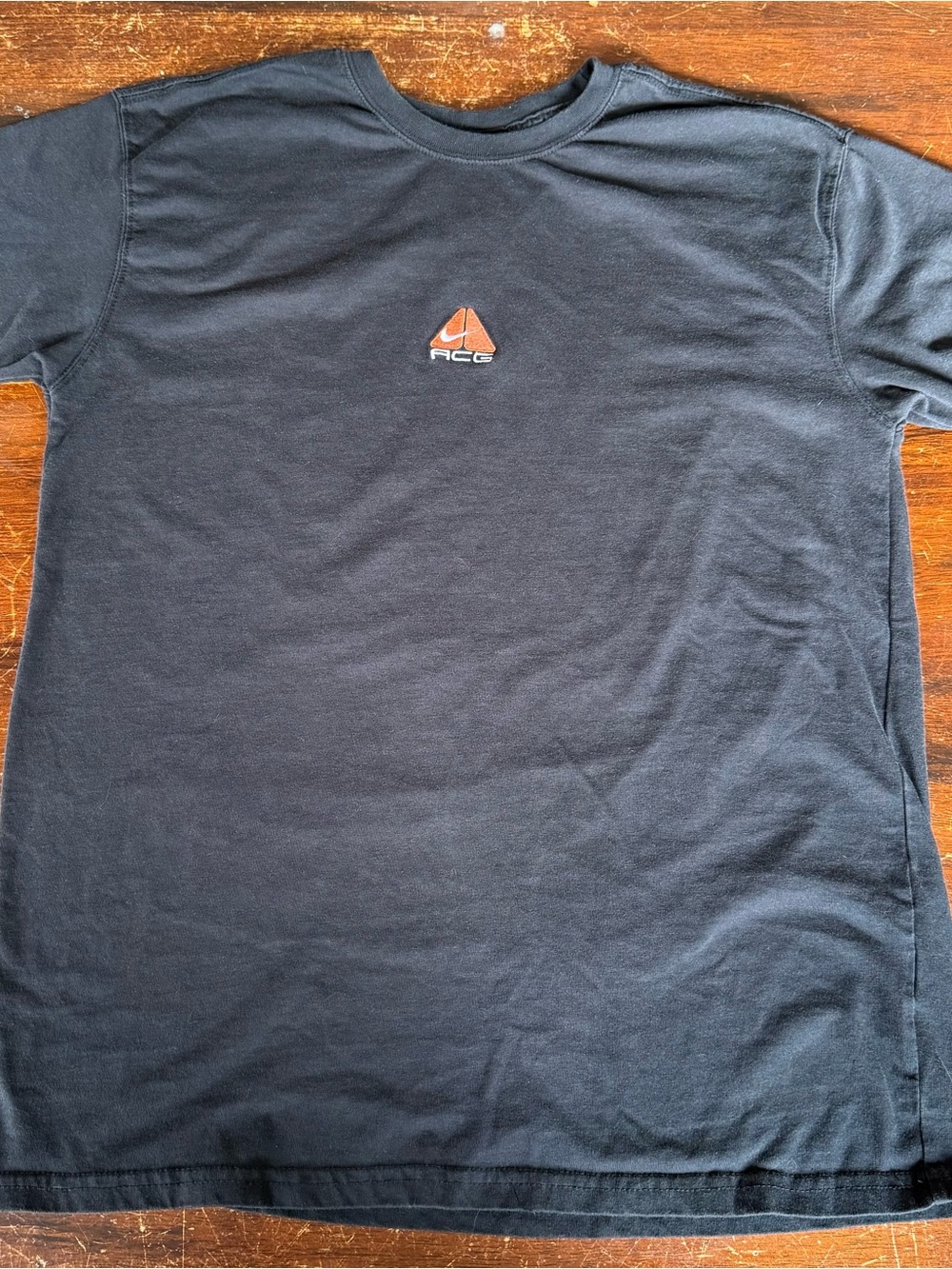 Nike ACG Black Short-Sleeve Crew Tee with Orange Logo